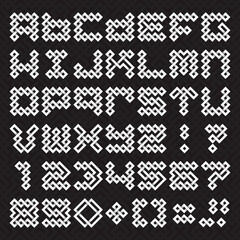 Fototapeta premium Font of interwoven strips. Alphabet of white relief letters and numbers on a black patterned background.