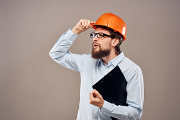 Business man in orange paint security papers work cropped view