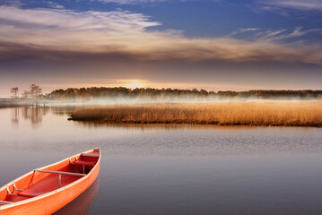 Fototapeta na wymiar The landscape of marshlands and the lake soft blurry background.