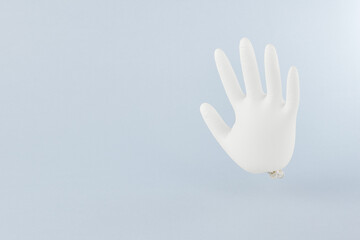 Fototapeta na wymiar Inflatable surgical gloves. Creative minimal concept