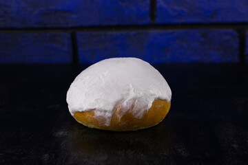 Fresh bun with white icing