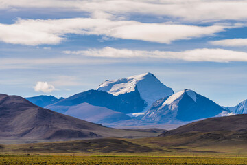 Fototapeta premium Photography picture of misty snow-capped mountains