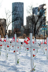 Calgary, Alberta November 11, 2020 - Thousands of crosses lined up row by row along Memorial Drive to commemorate the fallen Canadian soldiers that died in battle, located in Calgary, Alberta, Canada.