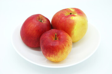 Dish Of Red And Yellow Apples