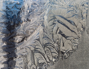 .the frosty patterns on the window