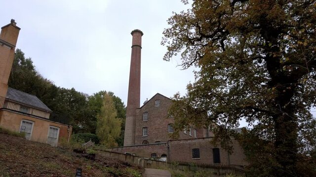 POV tilt shot of Quarry Bank Mill chimney