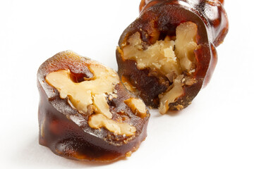 Walnuts on a string dipped in starch grape molasses. Churchkhela. Walnut sujuk.