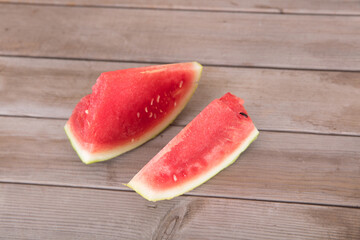 Two sliced watermelons on the summer table