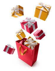 Red and gold gift boxes pop out from shopping bag over white background