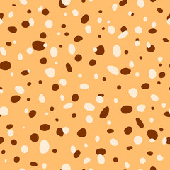 abstract brown ovals. vector seamless pattern. chaotic repetitive background. fabric swatch. wrapping paper. continuous print. design element for home décor, apparel, phone case, textile, cloth