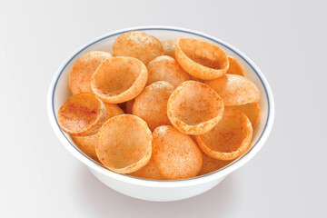 Crispy and crunchy Salty wheat cup & Katori, vatka, moon chips, vatki, fryums or frymus, snack food, Indian Pouch Packing Street Food, selective focus - Image