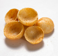 Crispy and crunchy Salty wheat cup & Katori, vatka, moon chips, vatki, fryums or frymus, snack food, Indian Pouch Packing Street Food, selective focus - Image