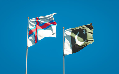 Beautiful national state flags of Faroe Islands and Pakistan.