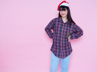 Fototapeta premium teenage girl wearing santa hat