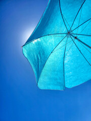 blue umbrella on the beach