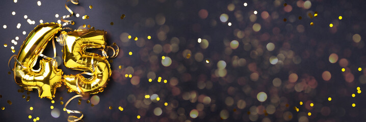 Gold foil balloon number, digit forty-five. Birthday greeting card with inscription 45. Anniversary...