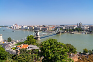 Budapest cityscape with Chain Bridge in front over Danube river and Parliament Building in the background