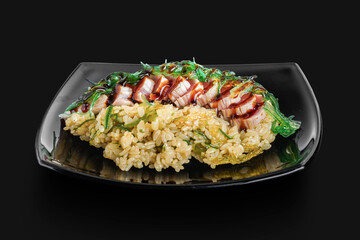 freshly made Japanese rice served with pieces of fish and wakame