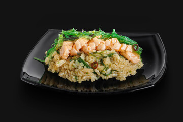freshly made Japanese rice served with pieces of fish and wakame