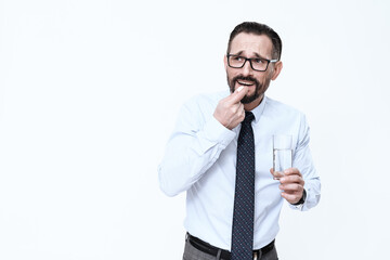 A man stands on a white background.