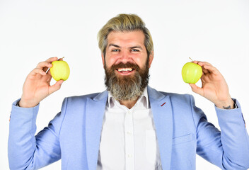 symbol of creative idea. vitamin and health dieting. fruit harvest industry. Effective successful business. Businessman in his office holding an apple. time for business lunch. healthy food concept