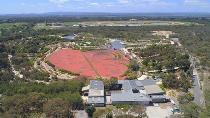 Orbit flight around Royal Botanic Gardens in Cranbourne, Australia on bright sunny day