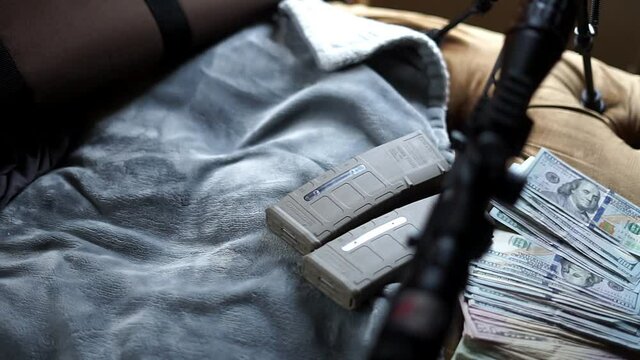AR-15 accompanied with Magazines and Money
