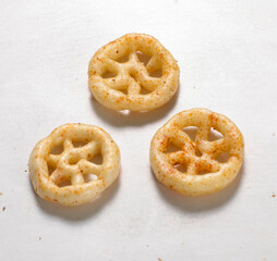 Crispy and crunchy Salty wheat wheel & Wheels, Wheelos, fryums or frymus, Fried and Spicy snack food, Indian Pouch Packing Street Food, selective focus - Image