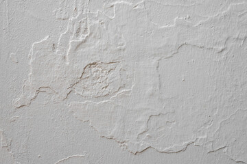 Fototapeta premium texture of the gray stucco. Abstract concrete background - in the form of a rough covered with folds wall, closeup