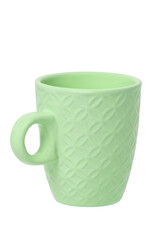 Mug of coffee. Closeup of a green ceramic mug or tea cup isolated on a white background. Macro.