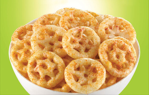 Crispy and crunchy Salty wheat wheel & Wheels, Wheelos, fryums or frymus, Fried and Spicy snack food, Indian Pouch Packing Street Food, selective focus - Image