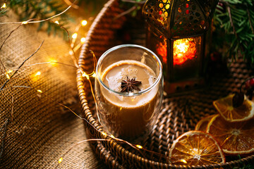 Christmas coffee with dried orange in a basket