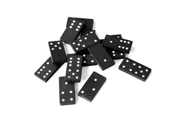 Black dominoes standing on isolated white background