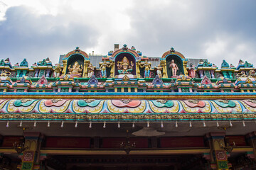 The roof and bas reliefs of a Sri Mahamariamman, oldest Hindu temple in Kuala Lumpur, Malaysia. View and decorate of the buildings. Travel concept