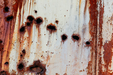 Grunge metal texture with rust and bullet holes. Abstract vintage background for photoshop