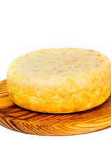 Tasty and big  typical spanish omelette on a wooden tray on white background