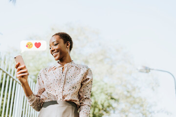 Woman sending love emojis