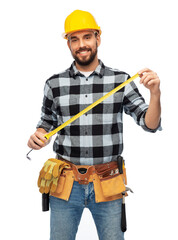 profession, construction and building - happy smiling male worker or builder in helmet with ruler over white background