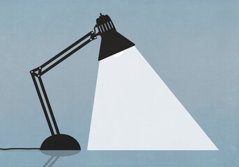 Bright task lamp shining on blue background

