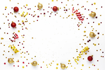 Festive Christmas Golden and red decorations on a white background. Festive new year sparkling texture.