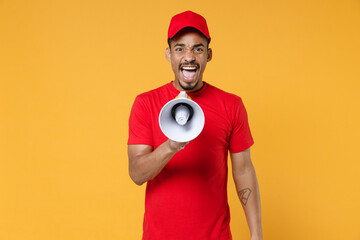 Fun crazy delivery employee african man in red cap blank t-shirt uniform workwear work courier...