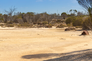 on the sandy shores of a small lake on the East Hyden Bin Road