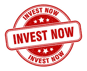 invest now stamp. invest now label. round grunge sign