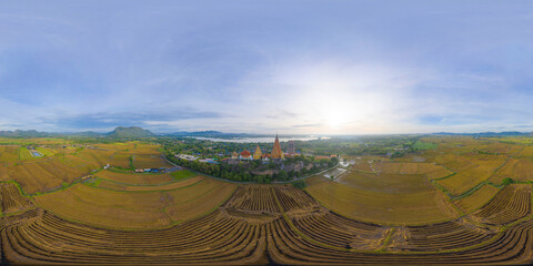 360 panorama by 180 degrees angle seamless panorama of aerial view of Big Golden Buddha Statue and...
