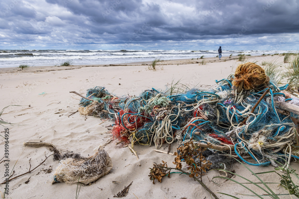 Canvas Prints Old fishing nets on Baltic Sea beach on Vistula Spit between Vistula Lagoon and Bay of Gdansk, near Katy Rybackie village, Poland