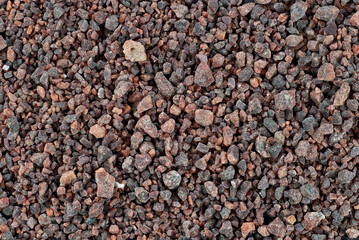 Black Tibetan salt close up. Texture of brown and black salt crystals.
