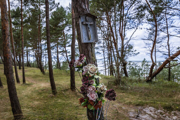 Catholic cross on a dune on Vistula Spit between Vistula Lagoon and Bay of Gdansk, near Katy Rybackie village, Poland