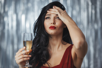 Drunk celebrating woman in red dress