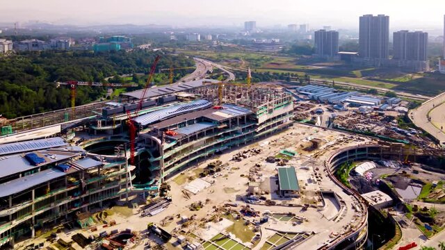 4K UHD hyperlapse Footage Of Aerial view mega mall construction in the urban city