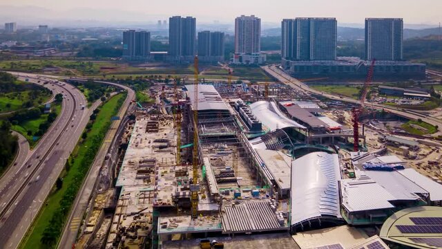 4K UHD hyperlapse Footage Of Aerial view mega mall construction in the urban city